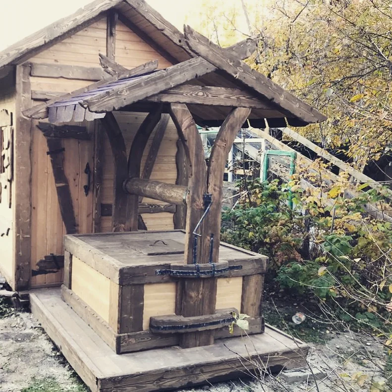 Колодец с двускатной крышей